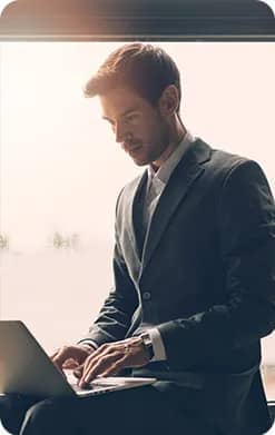 Business professional working on a laptop